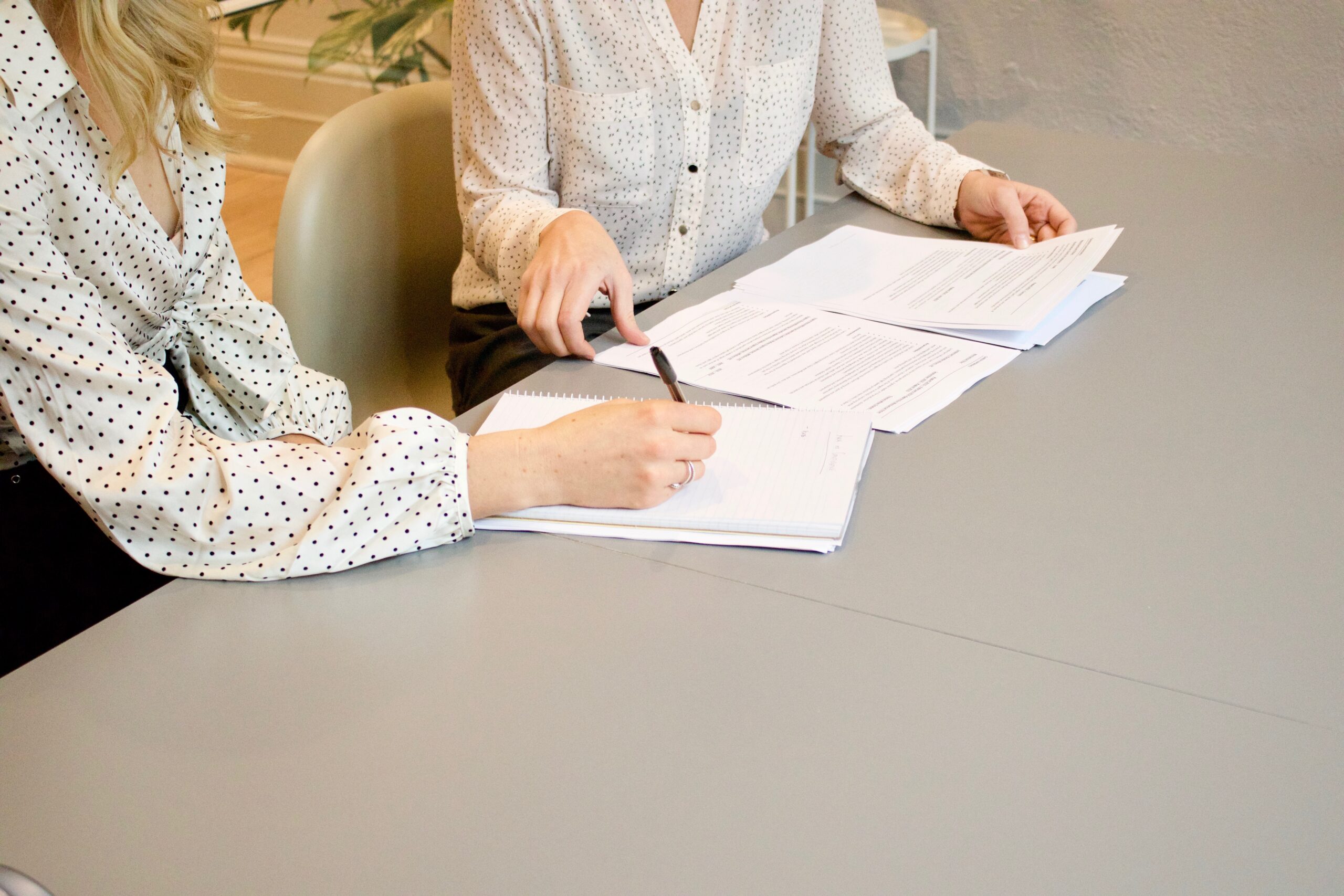 two women reviewing documents