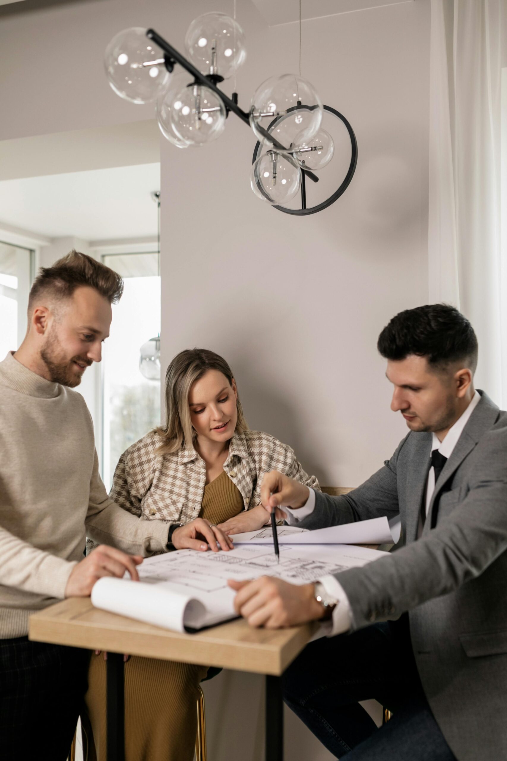 Property manager sining papers with tenants