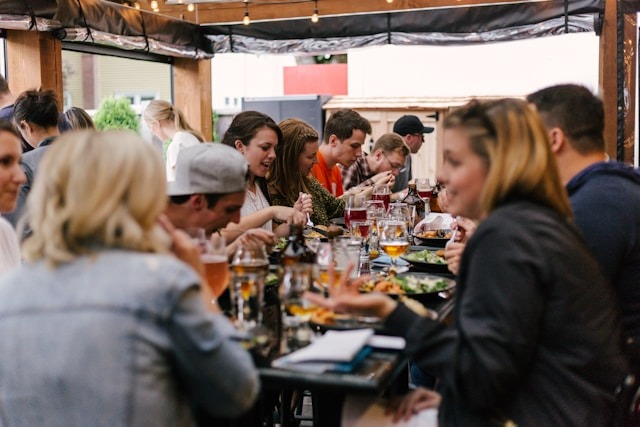 A group of people enjoying a meal.