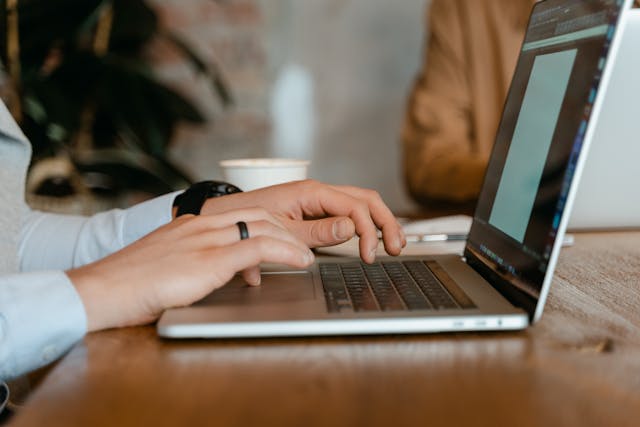 a person working at their laptop