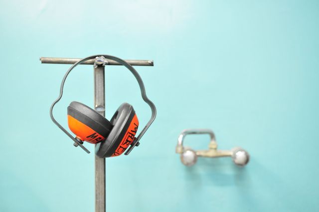 ear protectors hanging on a stand